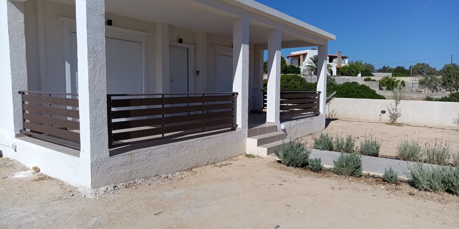 One Fence at a Time: Creating Our Summer Haven in Aegina